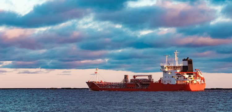 Red cargo oil tanker moving to Baltic sea