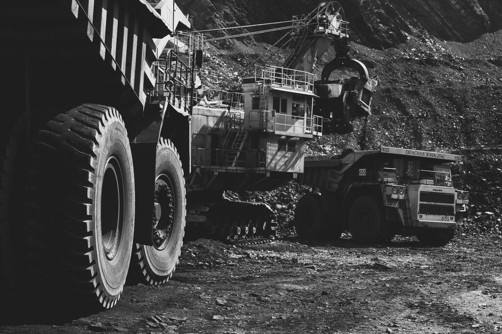 Heavy mining trucks operating at a Russian coal mine during the Russian coal industry crisis in 2026