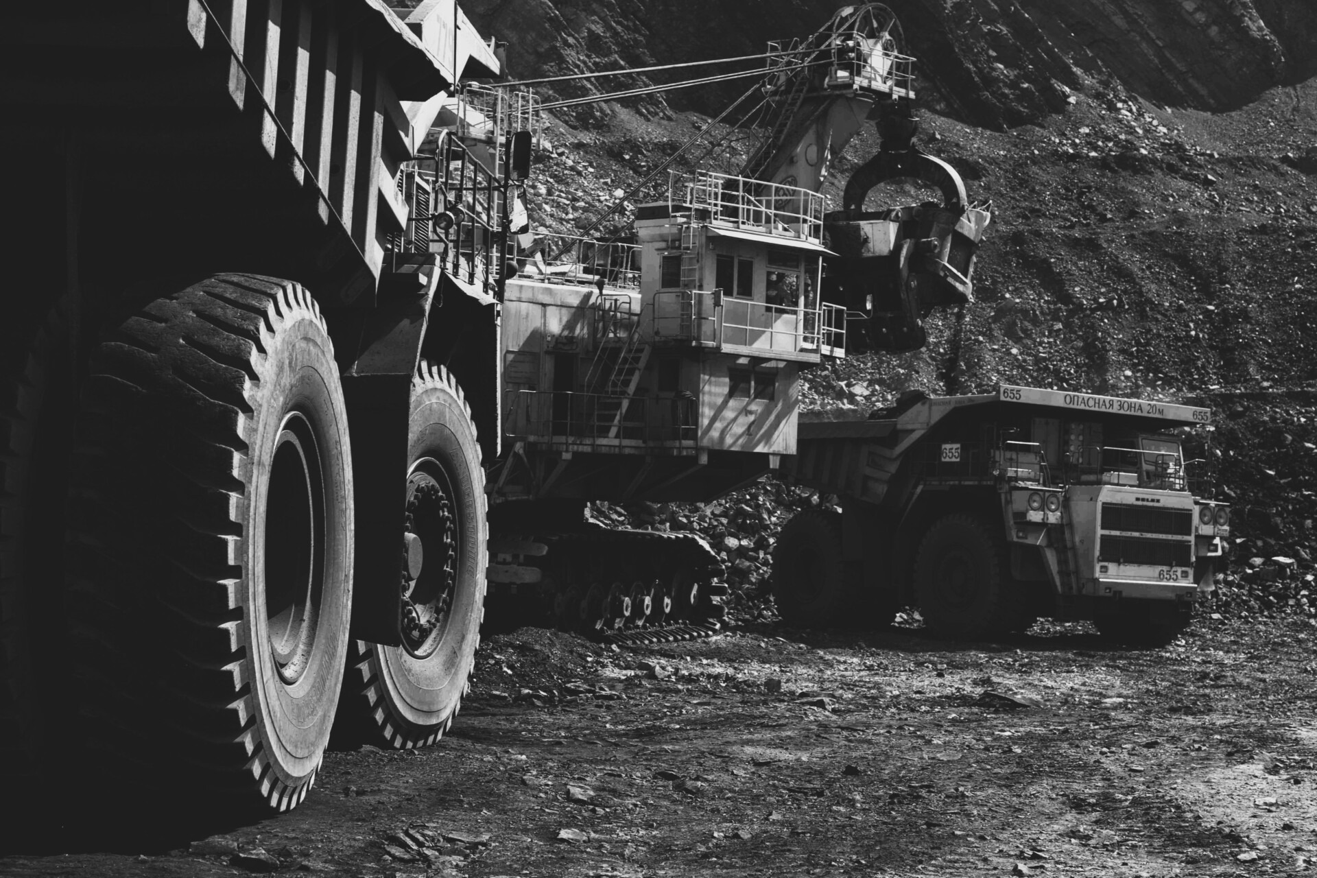Heavy mining trucks operating at a Russian coal mine during the Russian coal industry crisis in 2026