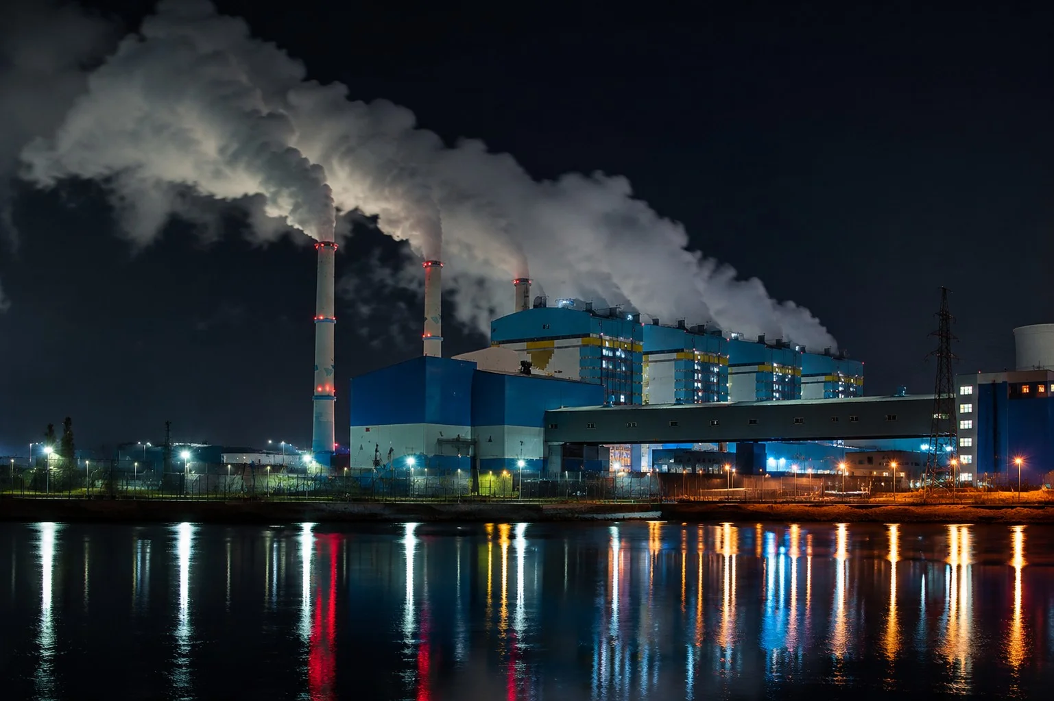 Coal-fired power plant operating at night, representing rising coal demand in South Korea