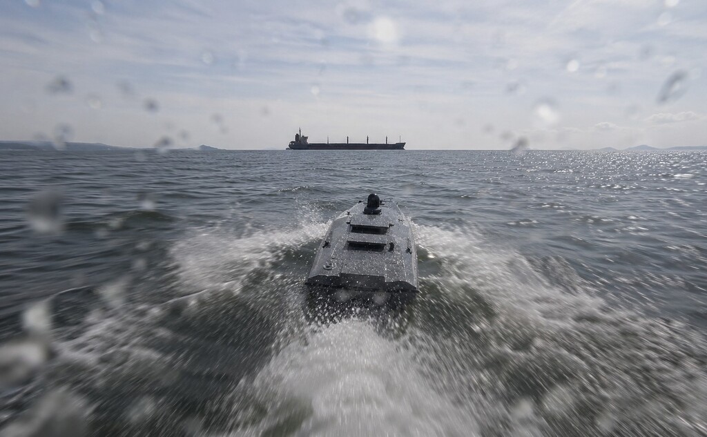 Cargo vessel in the Black Sea as Russian coal exports face disruption from drone attacks and suspended port operations.